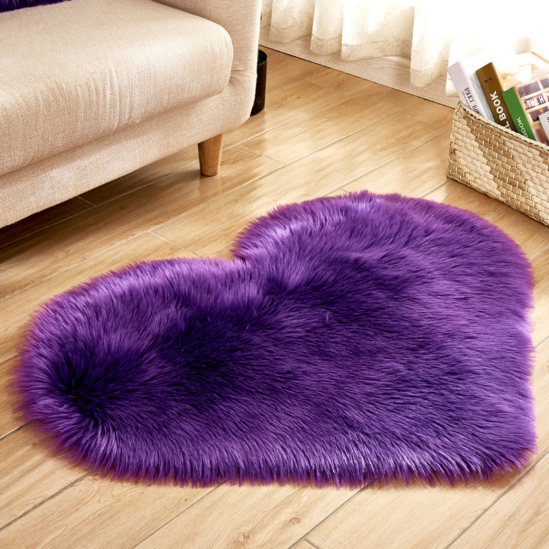 Plush home heart-shaped rug by the bedroom bed