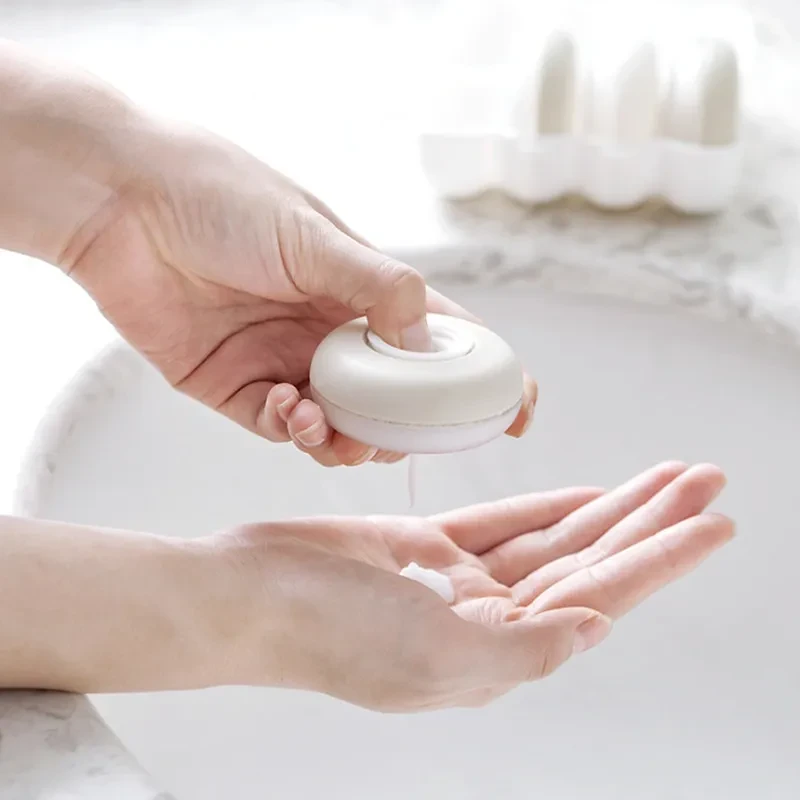 Press-type lotion sub-bottle