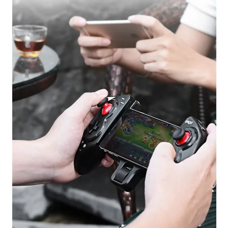 Eat chicken artifact wireless Bluetooth mobile phone tablet stretching game handle Jedi survival PG-9023