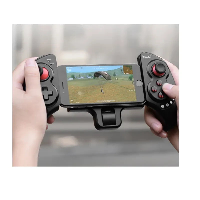 Eat chicken artifact wireless Bluetooth mobile phone tablet stretching game handle Jedi survival PG-9023