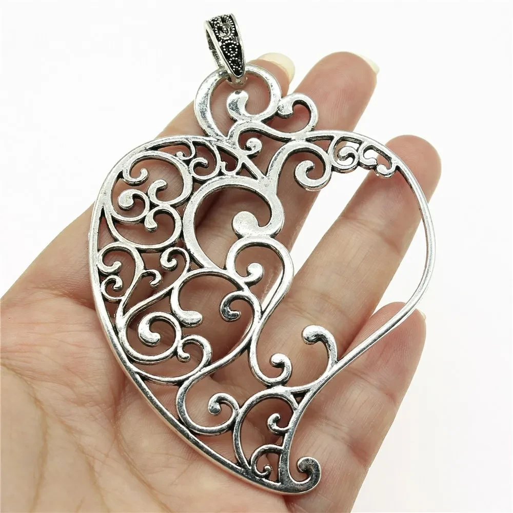 Geometric Carved Peach Heart Pendant