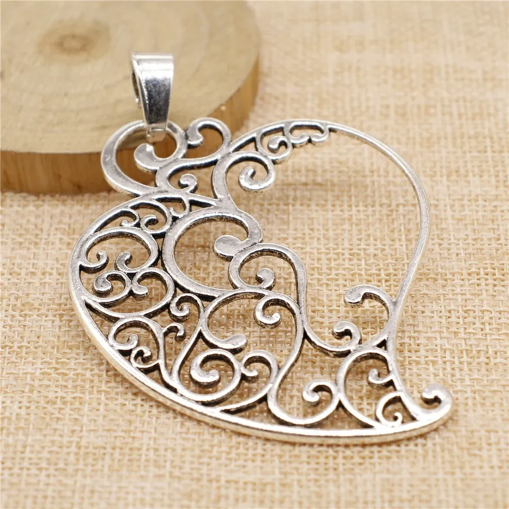 Geometric Carved Peach Heart Pendant