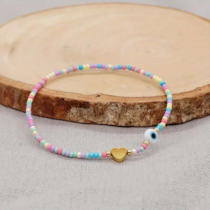 Bohemian Handwoven Glass Bead Bracelet with Heart Charm and Evil Eye Accent, Adjustable Multicolor Strand for Daily Wear and Gift-Giving, No Plating  1PC